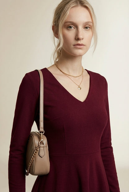 Close-up of the model wearing CAPUCINE | Robe courte évasée a volants