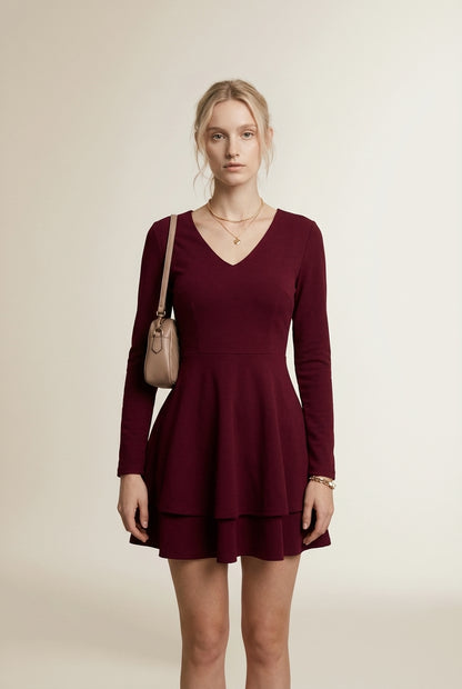 Full body view of the model wearing CAPUCINE | Robe courte évasée a volants