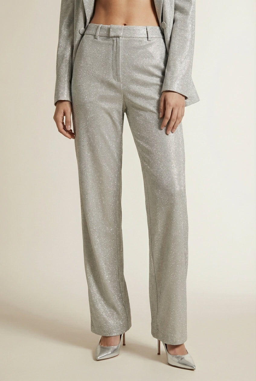 Close-up of the model's lower body wearing TANJA | Ensemble pailleté 3 pièces – blazer, pantalon & top