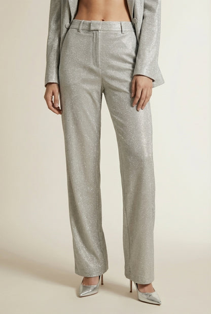Close-up of the model's lower body wearing TANJA | Ensemble pailleté 3 pièces – blazer, pantalon & top