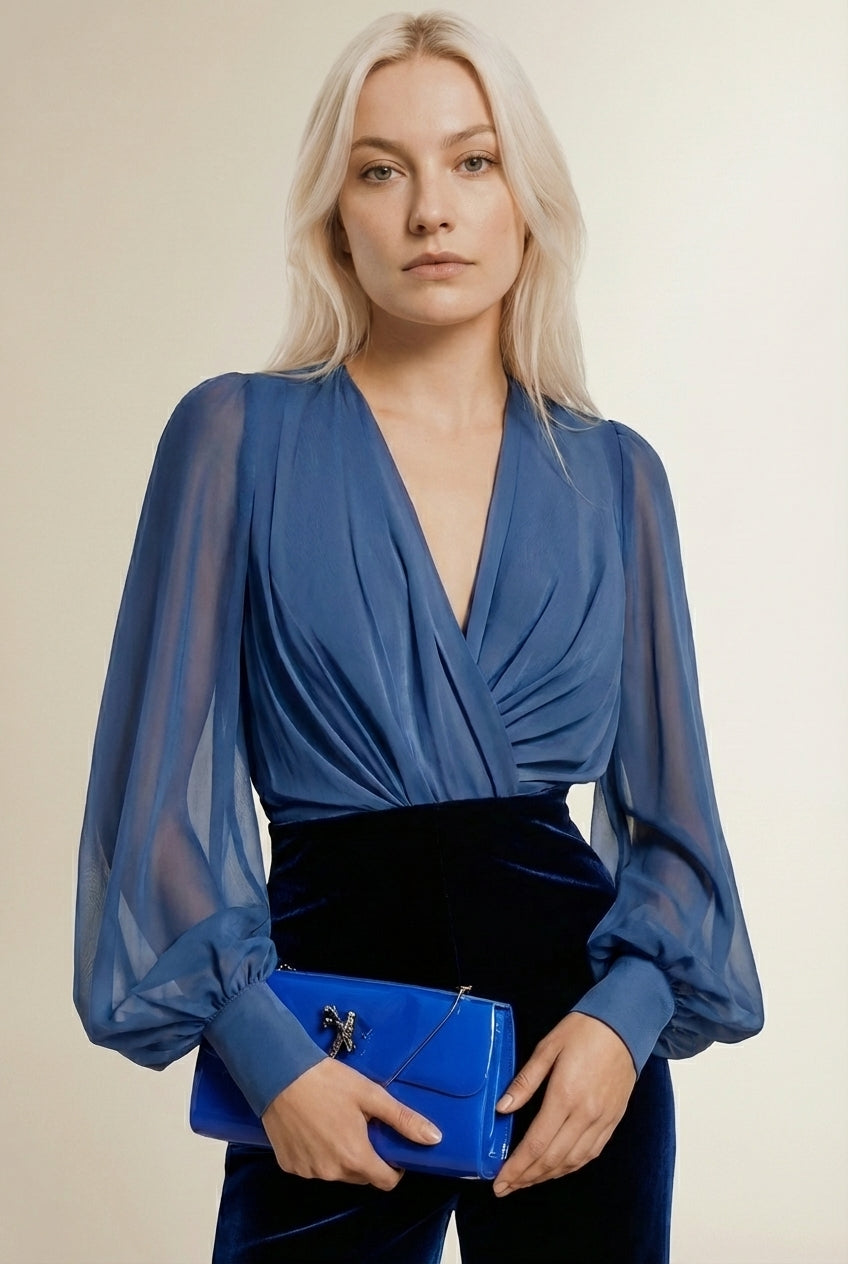 Close-up of the model wearing TINA | Combinaison Cocktail – Transparence & Plissés Sculptants